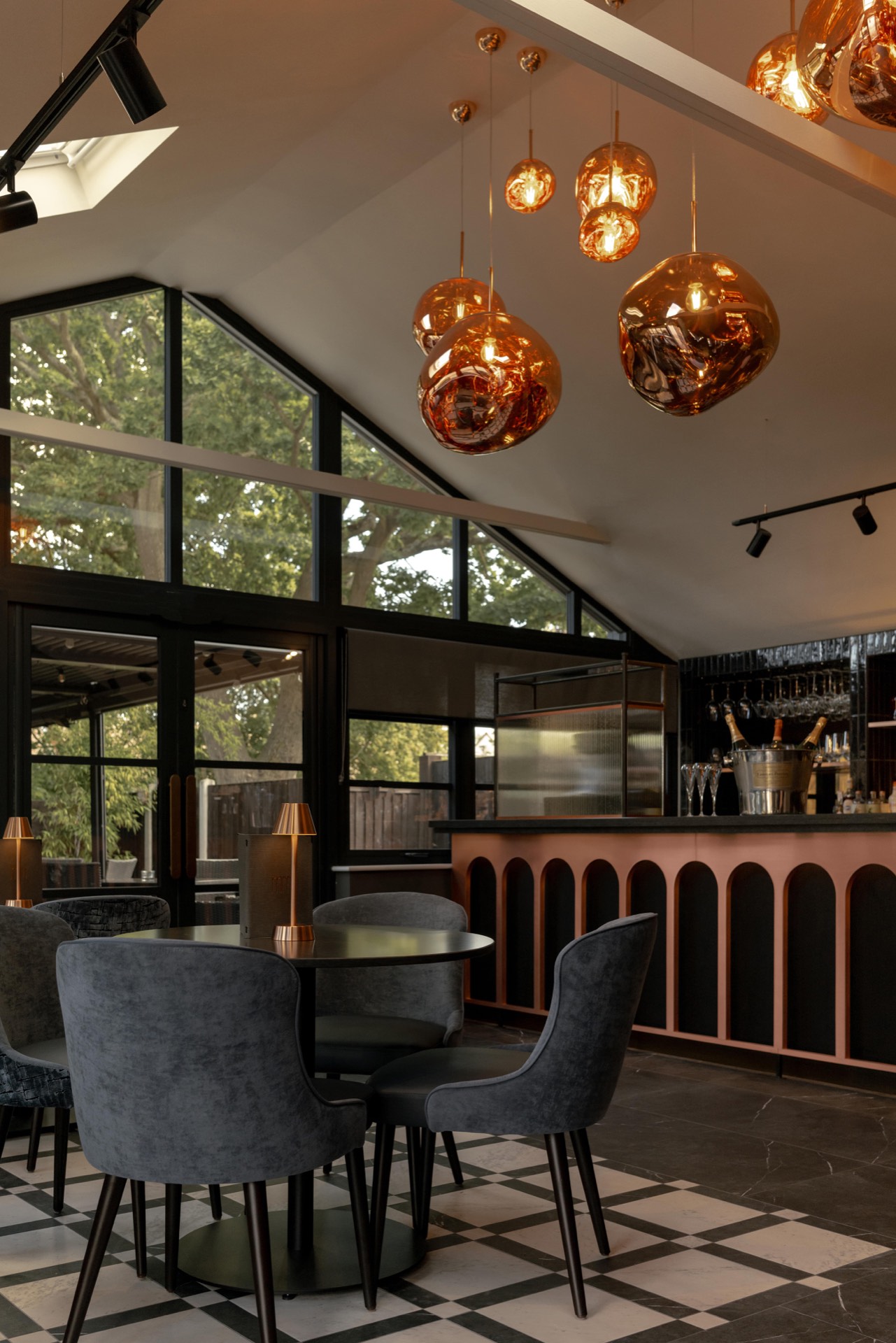 Velvet chairs in the bar area
