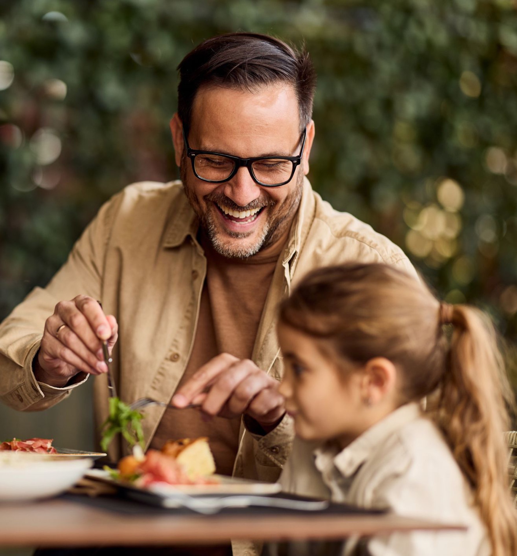 A young diner enjoying a meal at Mason's