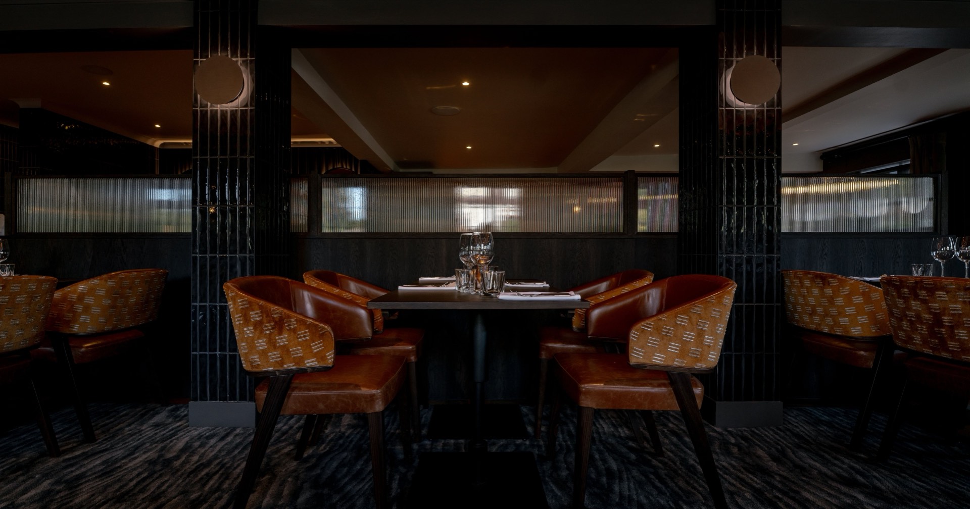 A copper pendant light fixture at Mason's