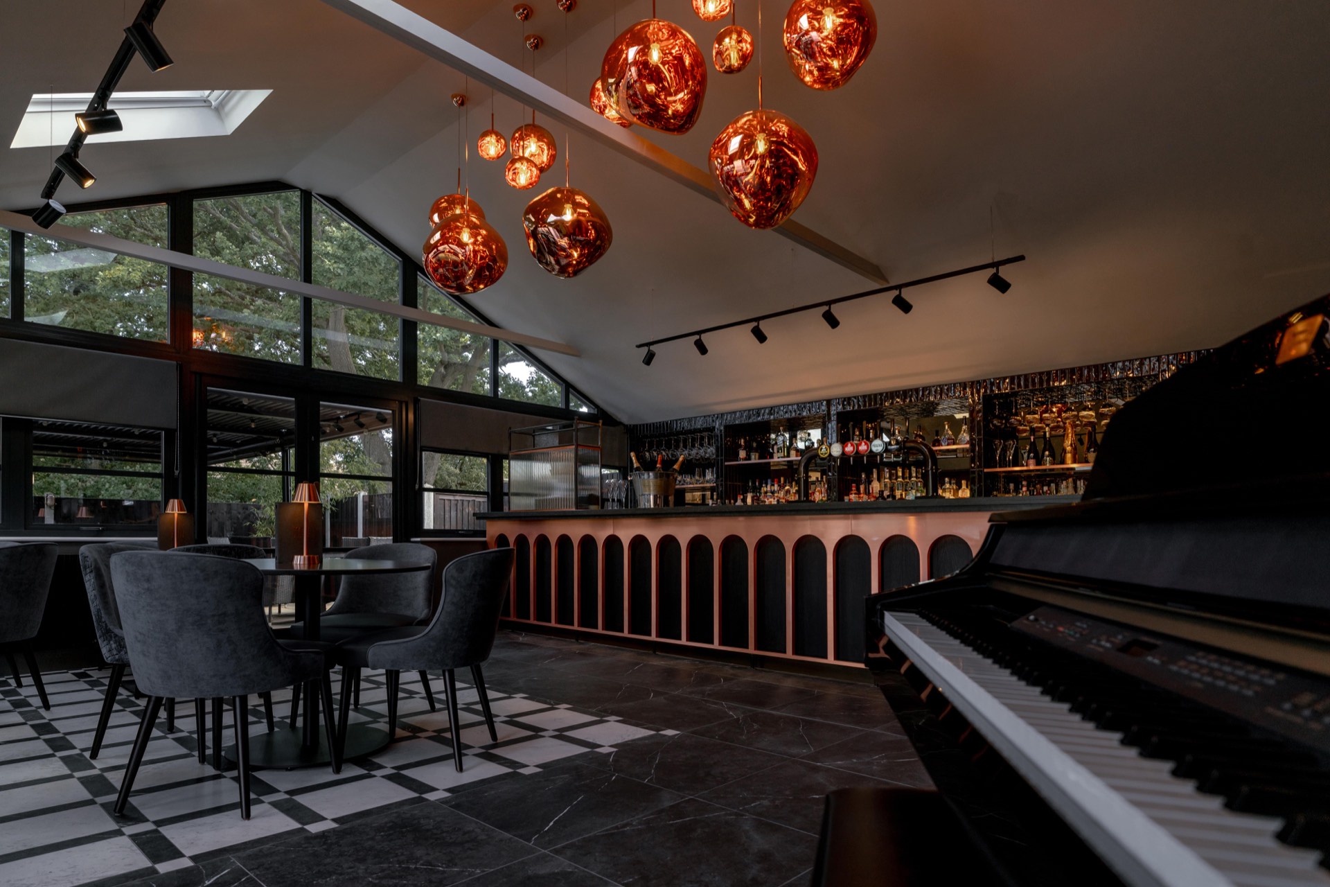 The bar with piano and seating