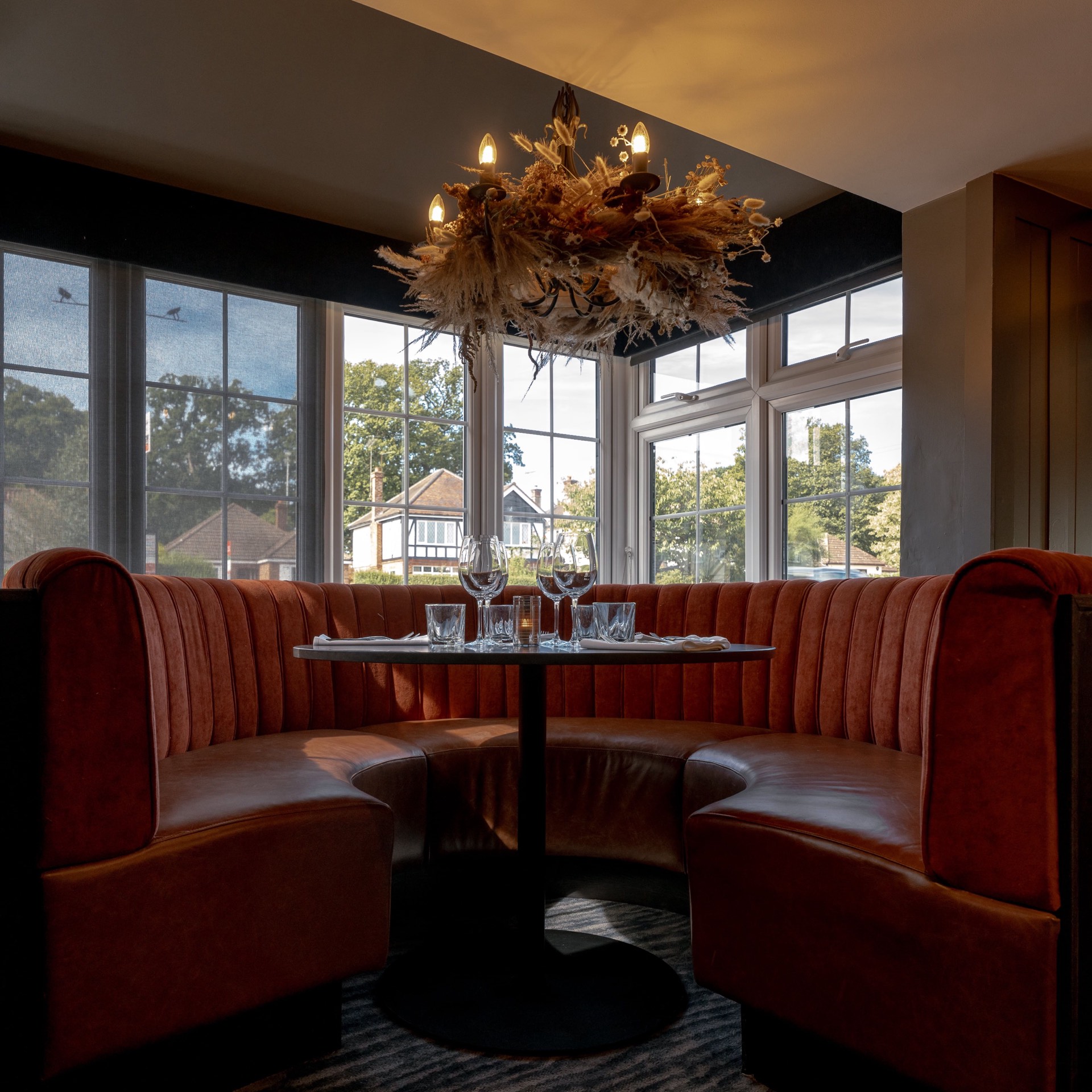 A cosy booth with a chandelier
