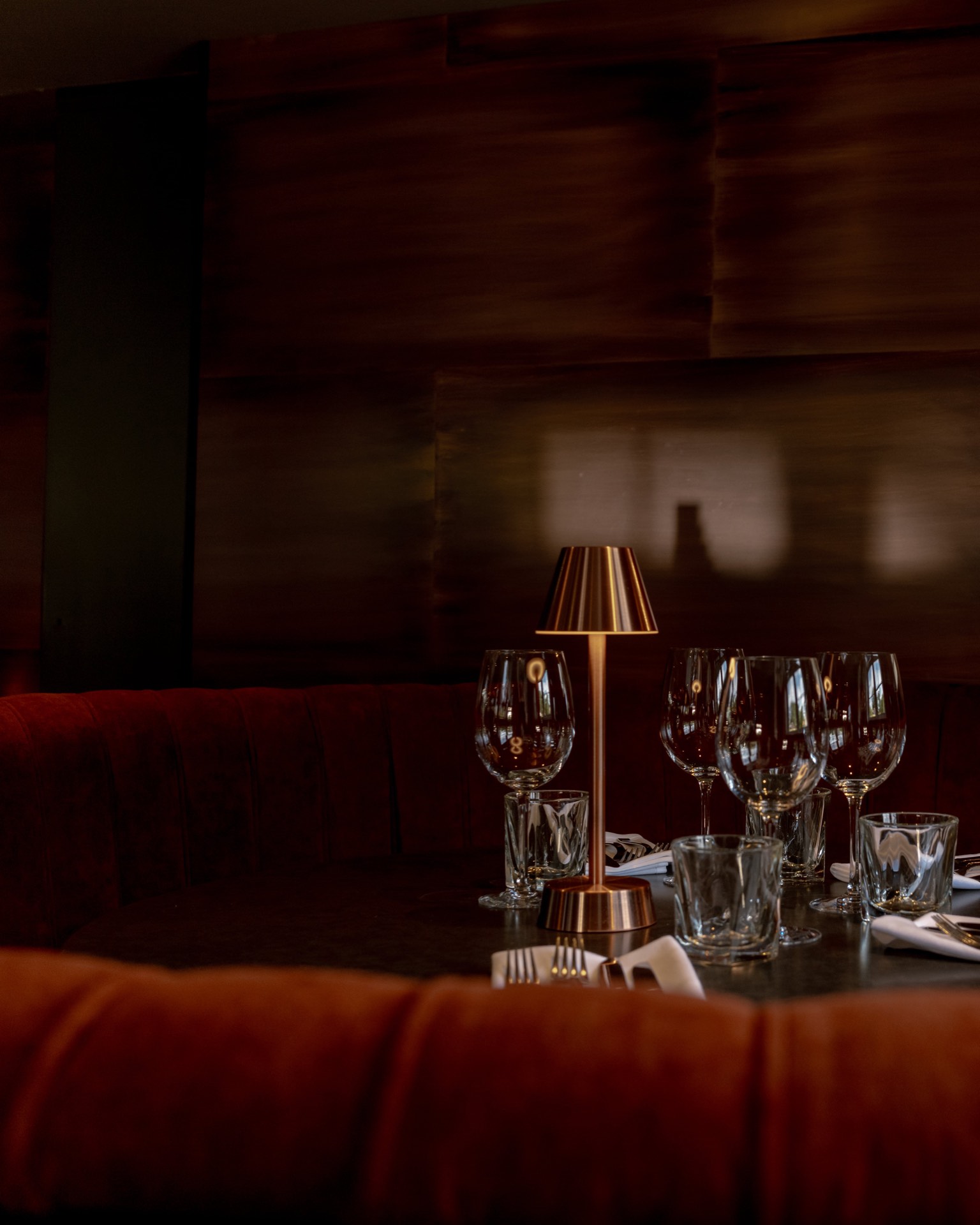 A red velvet dining booth at Mason's