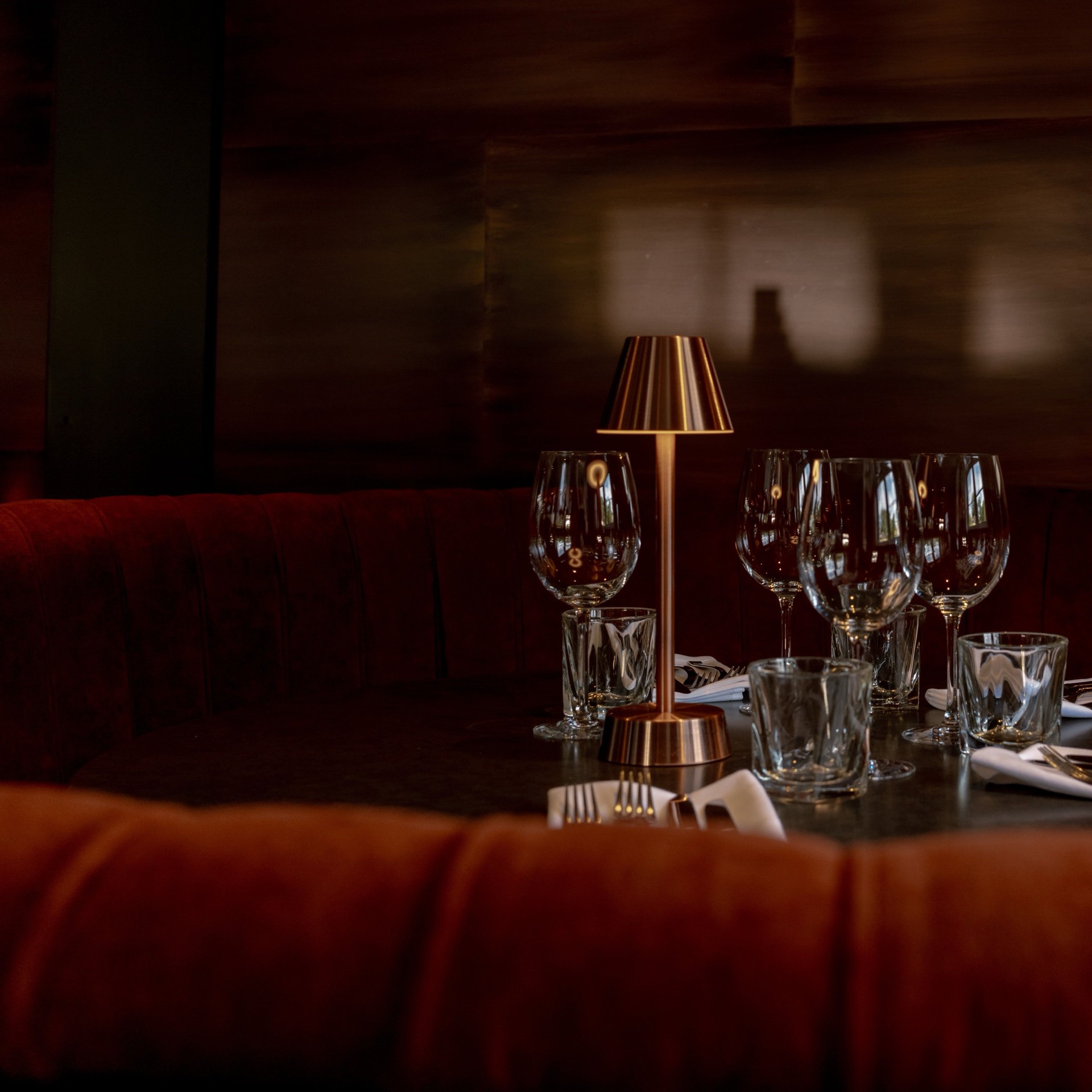 A decorative wooden partition in the restaurant