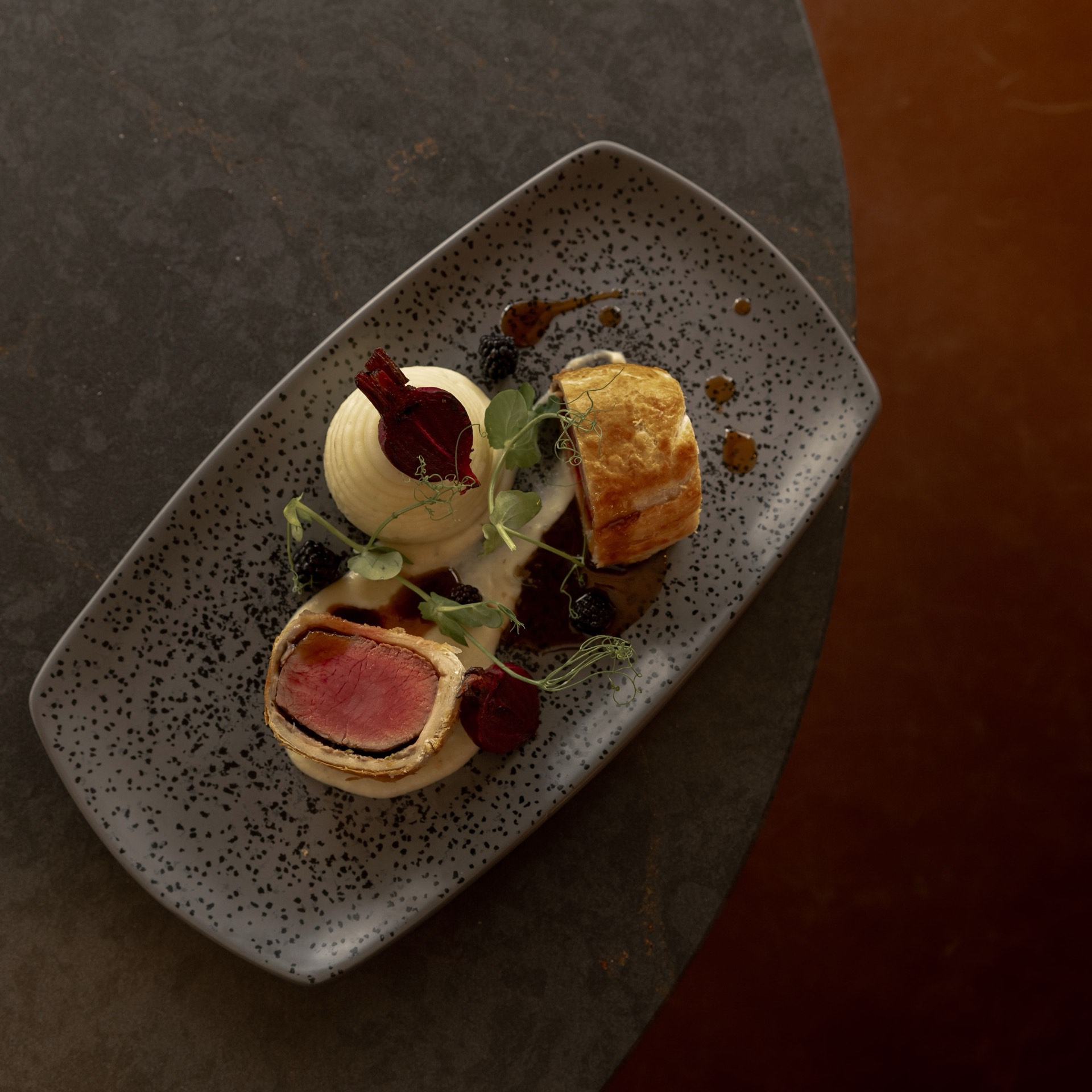 Wellington with creamed potato and garnishes