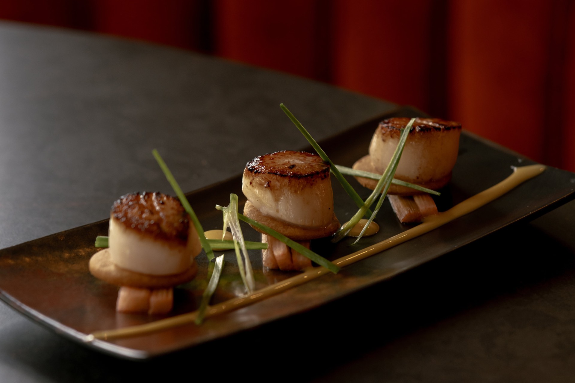 Seared scallops served at Mason's