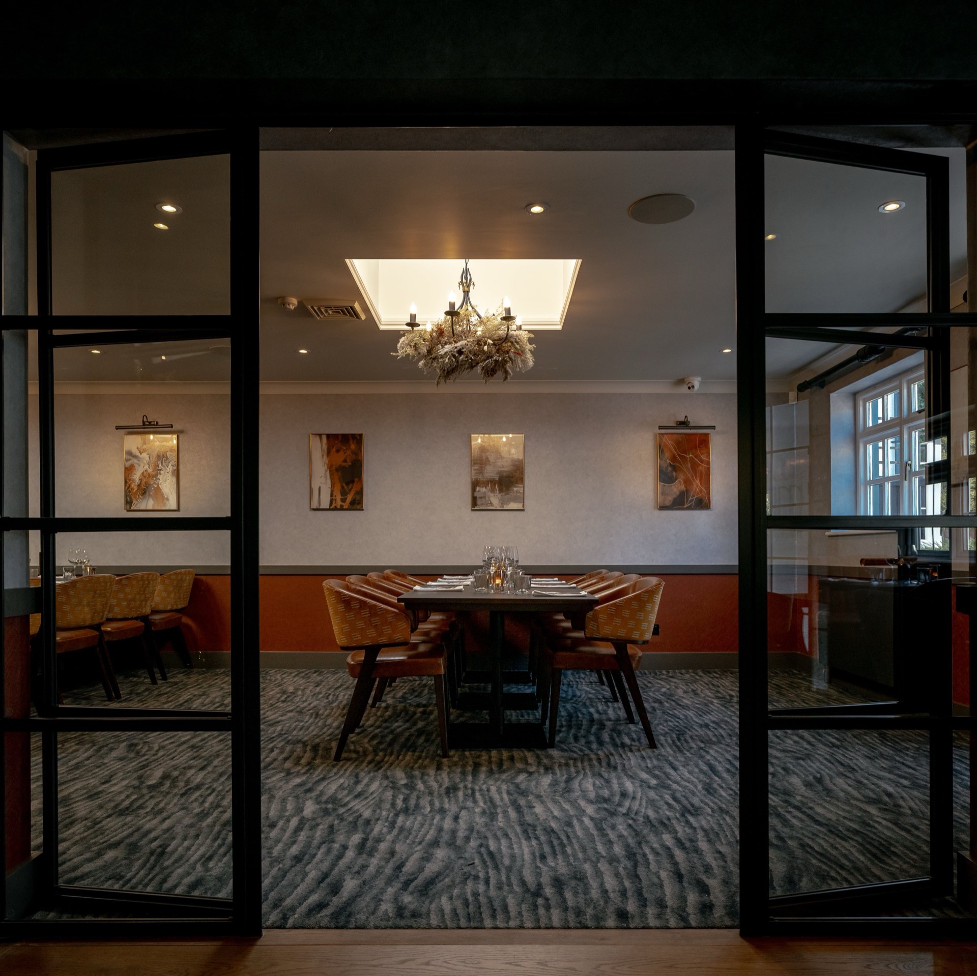 The private dining room at Mason's with modern decor and a large table
