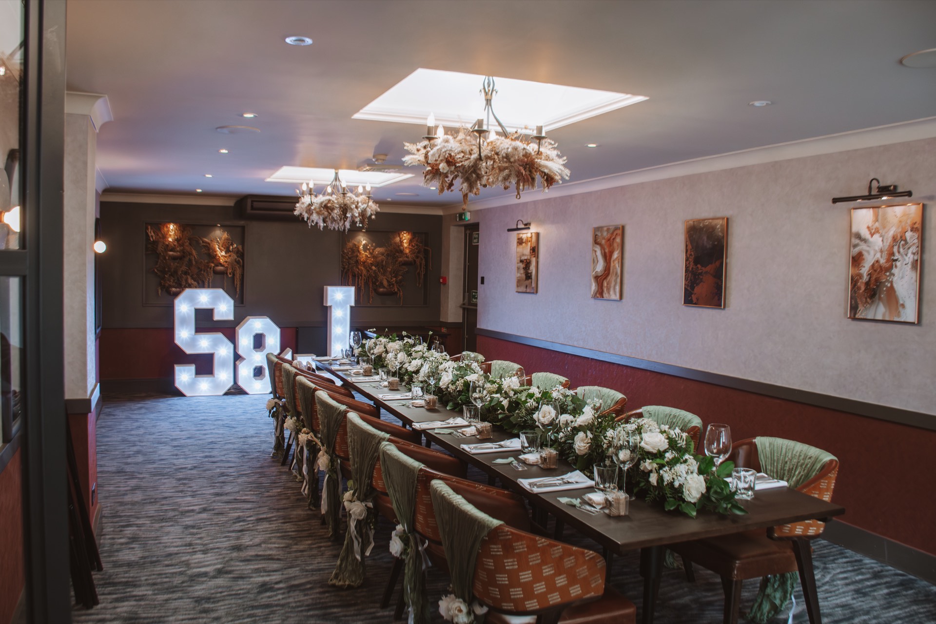 A banquet table dressed with flowers